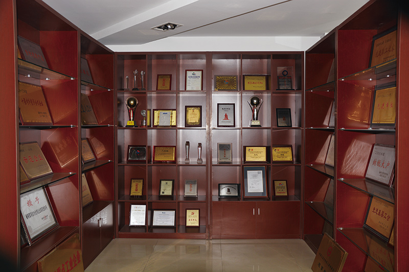 DAJ honor room with certificates and trophies